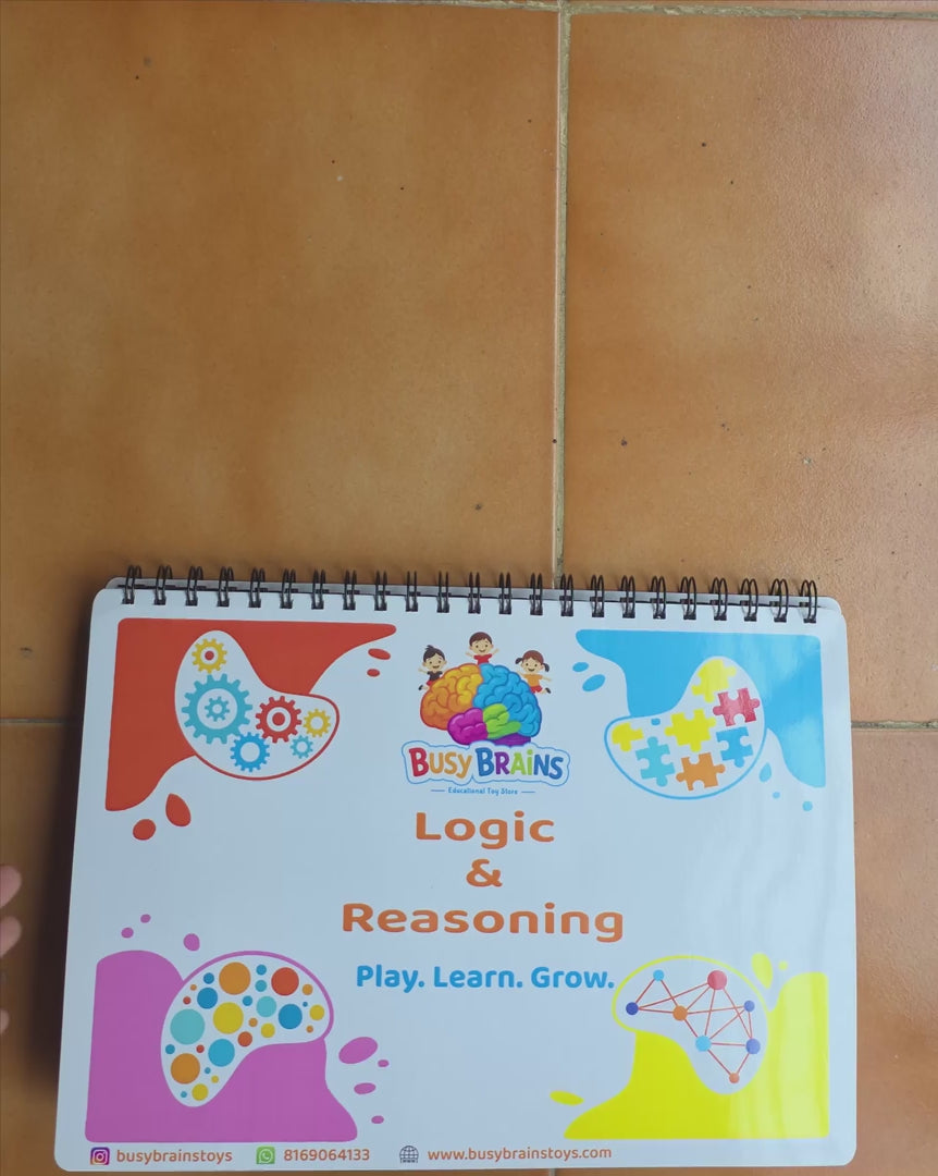 Toddler flipping through Busy Brains Logic and Reasoning Activity Binder with Montessori learning pages